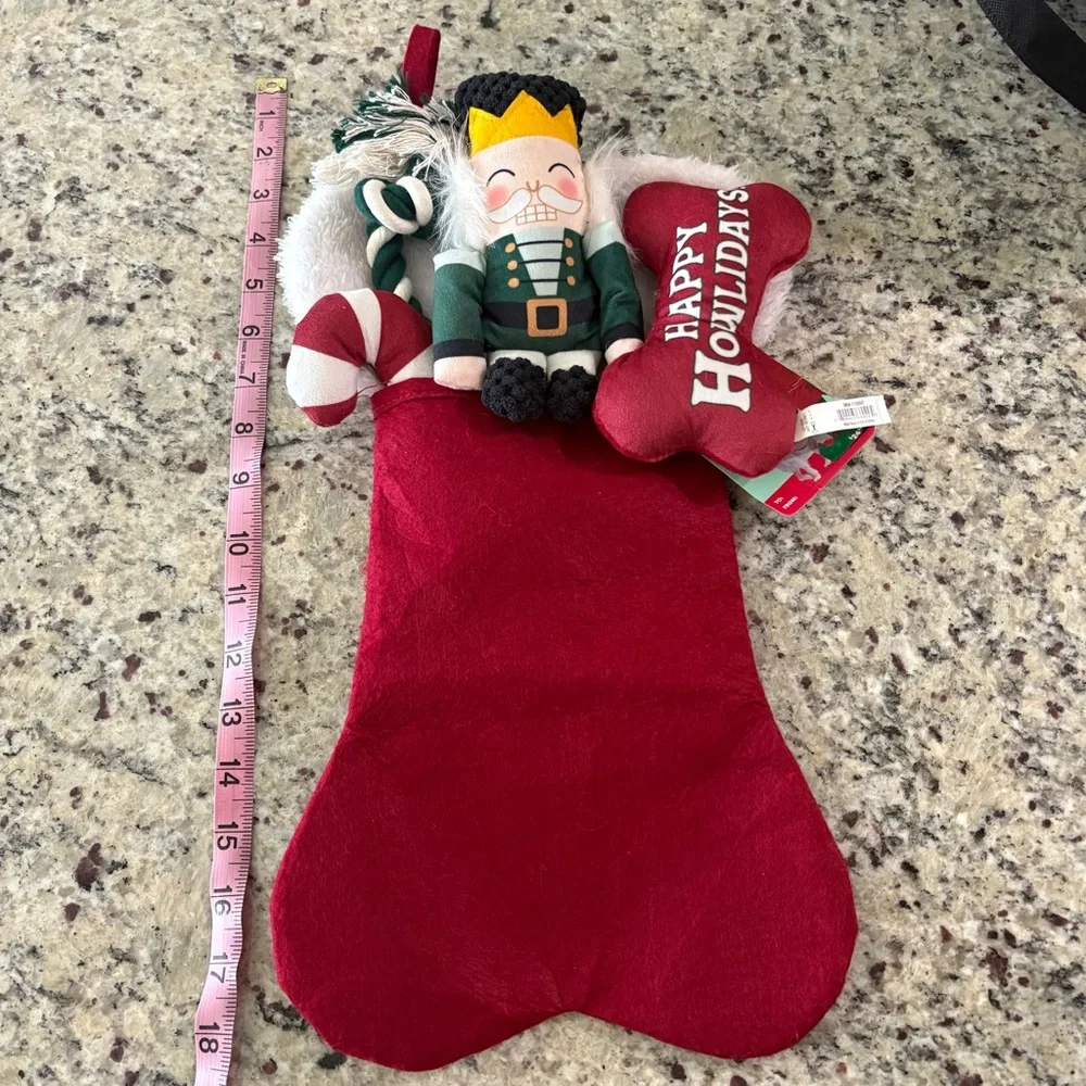 Merry Makings 4-piece dog toy set New with Tag in a red stocking